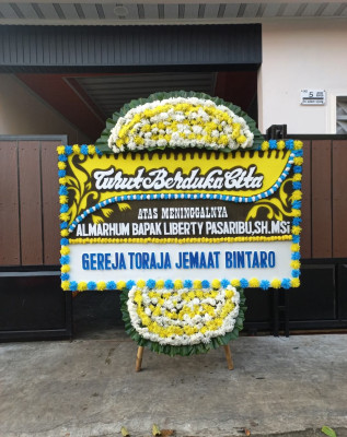 Papan Bunga Duka di Cikalongwetan